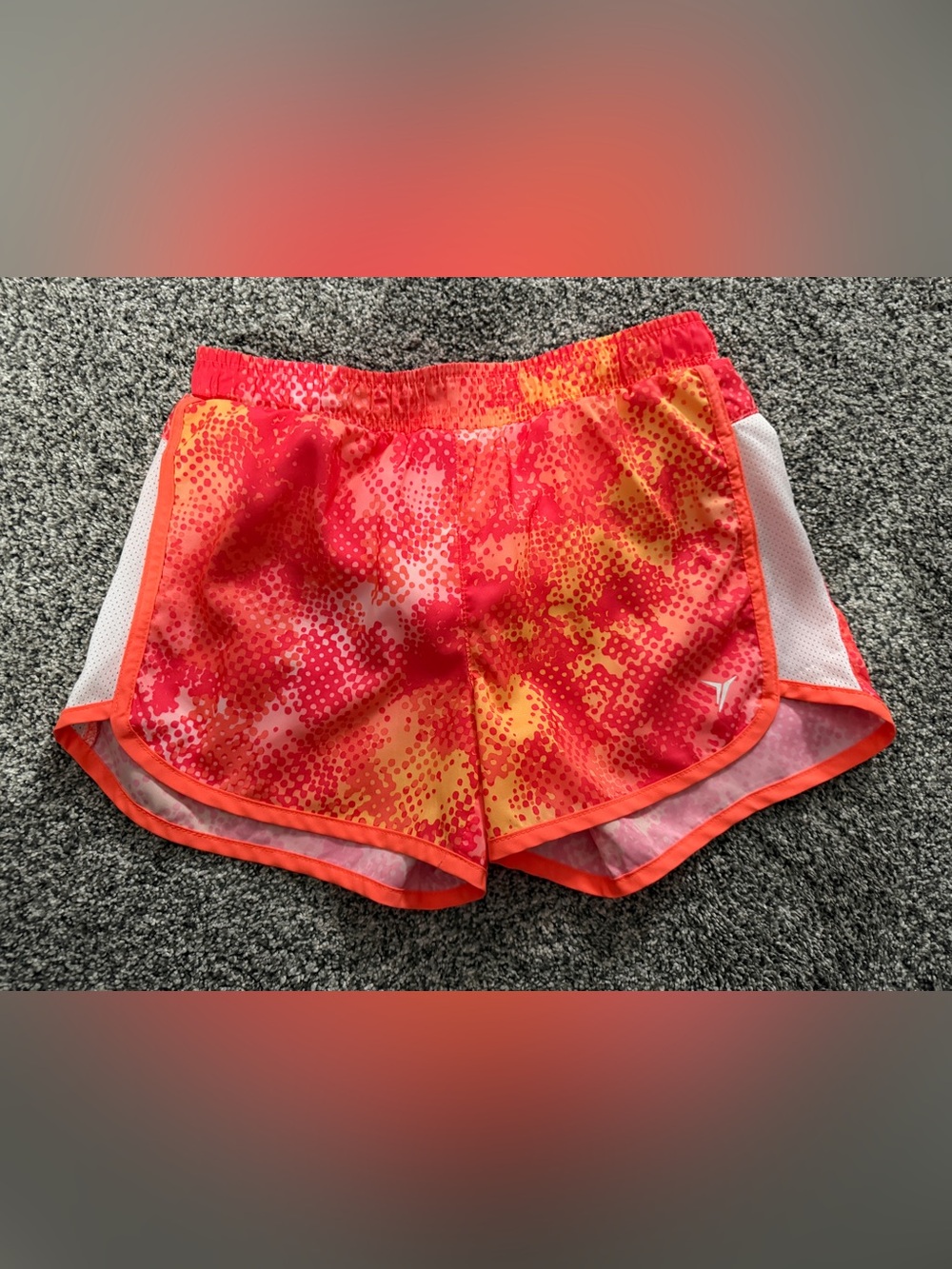 Old Navy kids shorts with red, orange, and yellow abstract dot pattern, size L/G